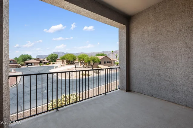 a view of a balcony with city view