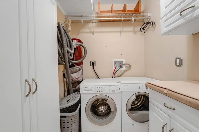 a view of a swimming pool with an outdoor seating