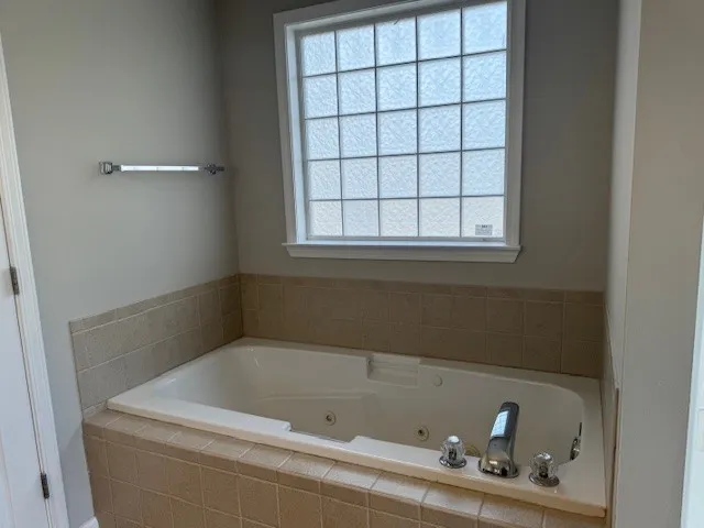 a bathroom with a bathtub