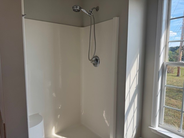251 7 Mile Ferry Road Cunningham, TN 37052 - Photo 19 of 36 a bathroom with a shower
