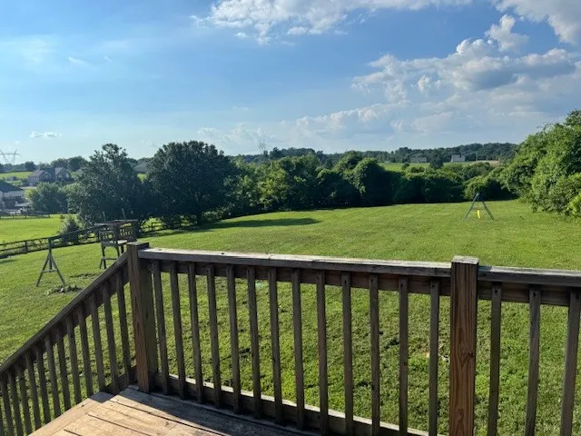 a view of a wooden roof deck