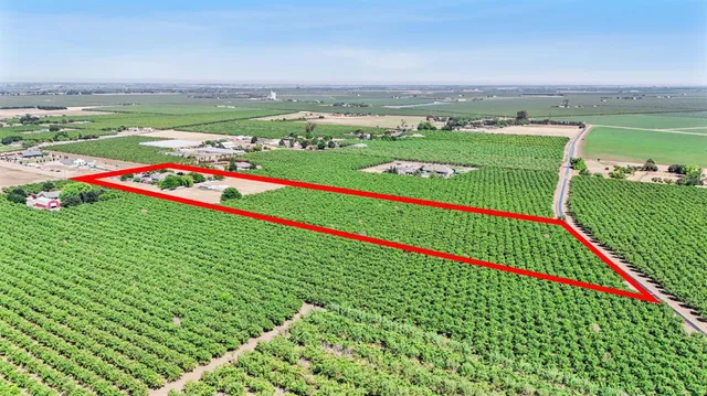 an aerial view of residential house with outdoor space