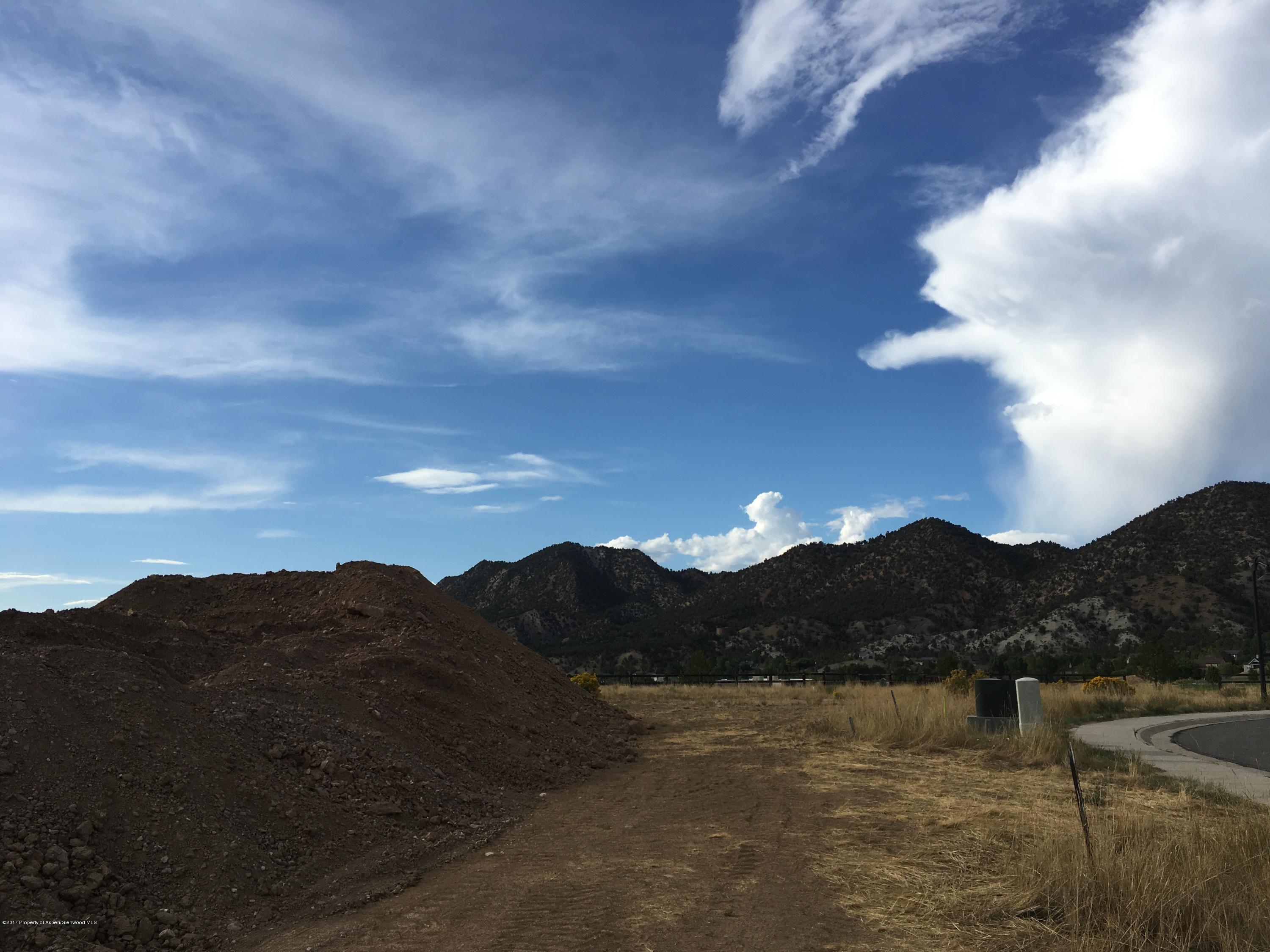 99 Redstone Drive New Castle, CO 81647 - Photo 13 of 14 a view of a lake and a mountain