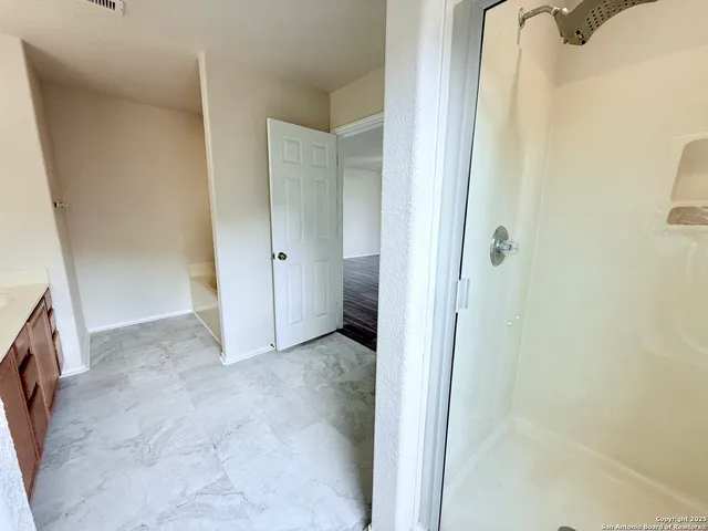 a view of a room with an empty space