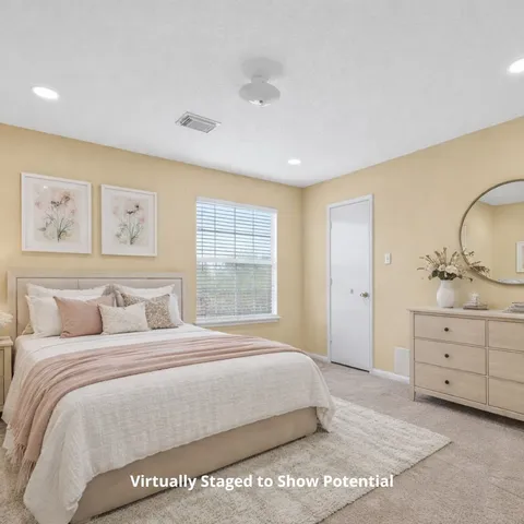 a bathroom with a sink vanity tub and shower