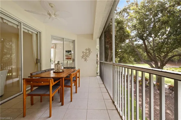 a view of a balcony and chairs