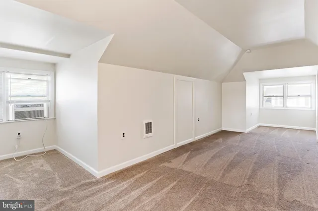 a front view of a house with a porch