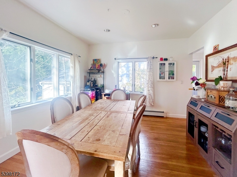 296 Glen Avenue Short Hills, NJ 07078 - Photo 7 of 25 a bed room with furniture and a window
