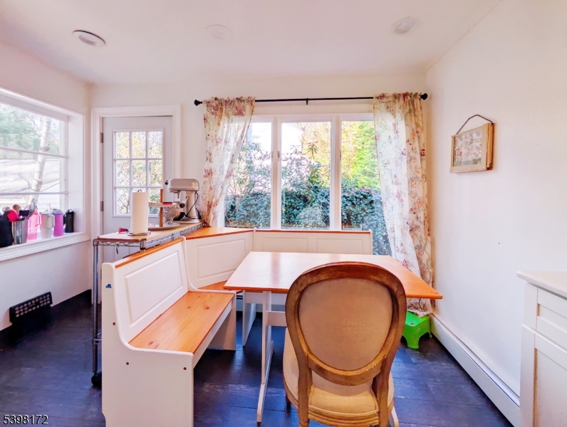 296 Glen Avenue Short Hills, NJ 07078 - Photo 10 of 25 a very nice looking dining room with a large window
