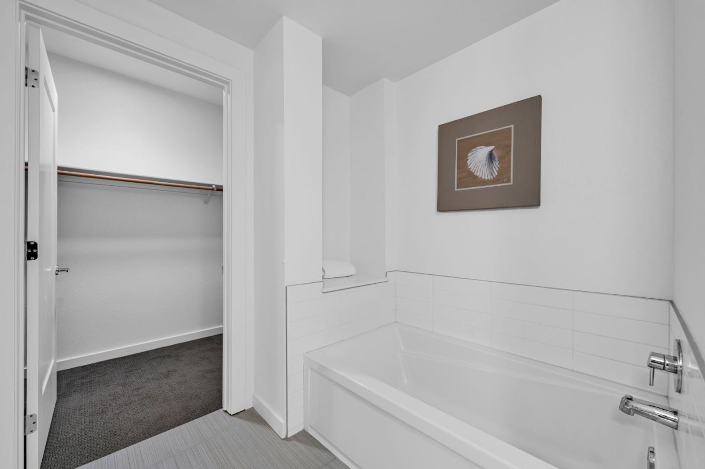 400 El Camino Real, Unit 117 Belmont, CA 94002 - Photo 23 of 54 a bathroom with a bathtub