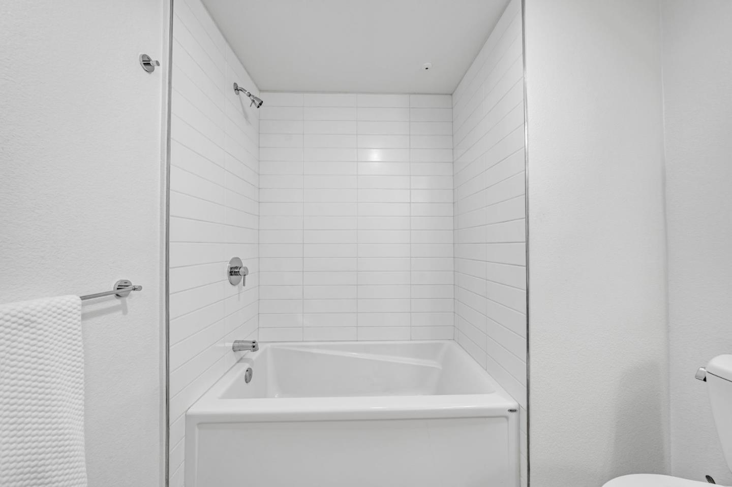 400 El Camino Real, Unit 117 Belmont, CA 94002 - Photo 25 of 54 a bathroom with a bathtub