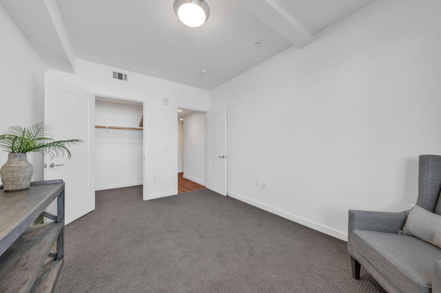 400 El Camino Real, Unit 117 Belmont, CA 94002 - Photo 27 of 54 a view of livingroom with furniture and window