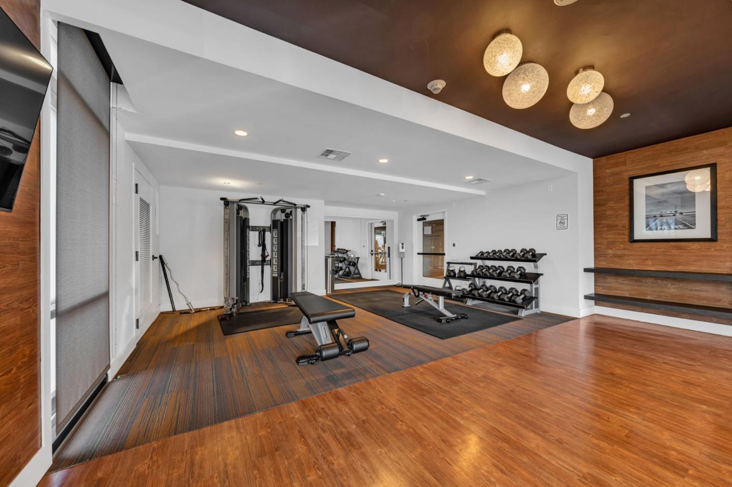 400 El Camino Real, Unit 117 Belmont, CA 94002 - Photo 37 of 54 a view of a room with gym equipment