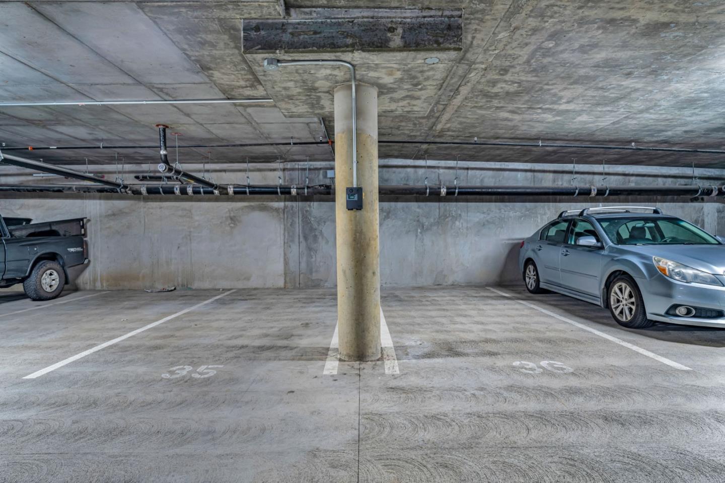 400 El Camino Real, Unit 117 Belmont, CA 94002 - Photo 45 of 54 a car parked in garage