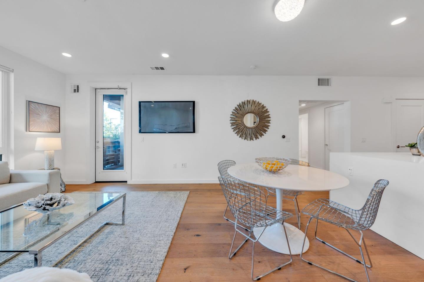 400 El Camino Real, Unit 117 Belmont, CA 94002 - Photo 8 of 54 a living room with furniture and a large window