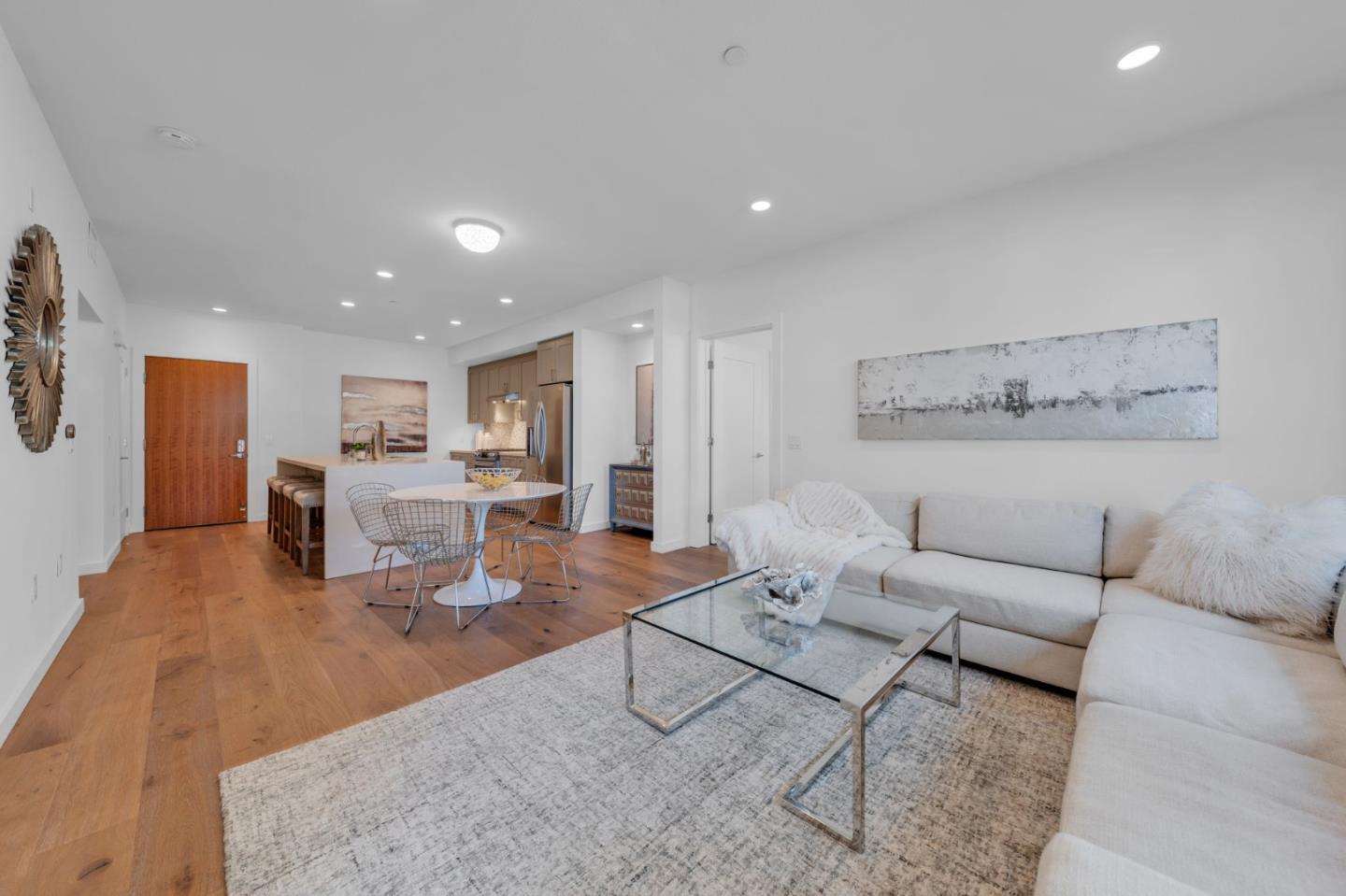 400 El Camino Real, Unit 117 Belmont, CA 94002 - Photo 10 of 54 a living room with furniture and wooden floor