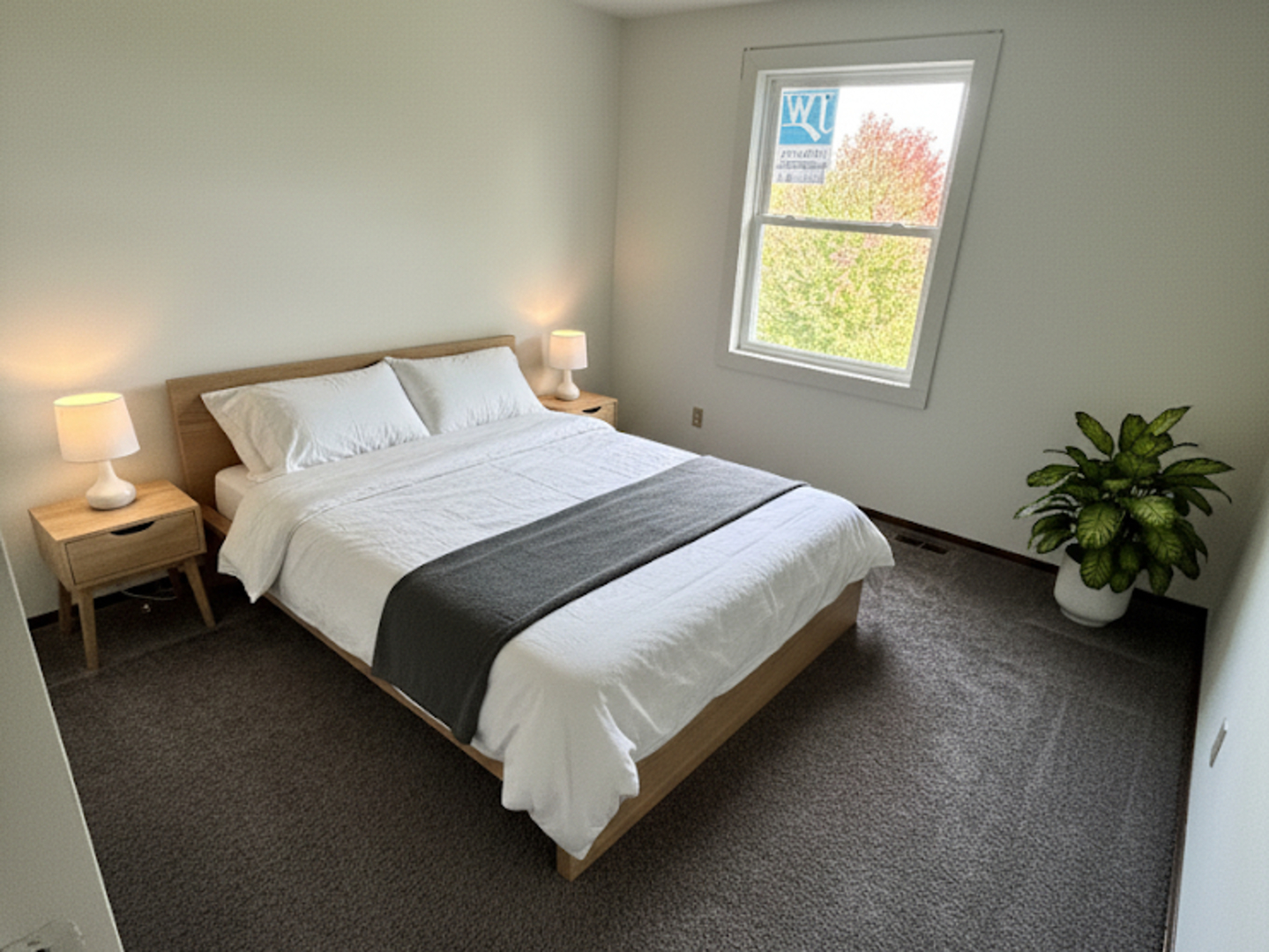 1513 Elder Drive Aurora, IL 60506 - Photo 13 of 26 a large bed sitting in a bedroom next to a window