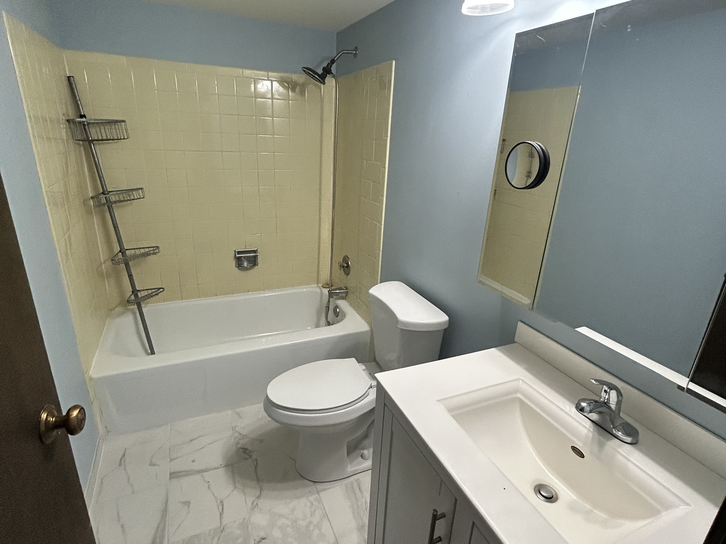 1513 Elder Drive Aurora, IL 60506 - Photo 18 of 26 a bathroom with a sink toilet and shower