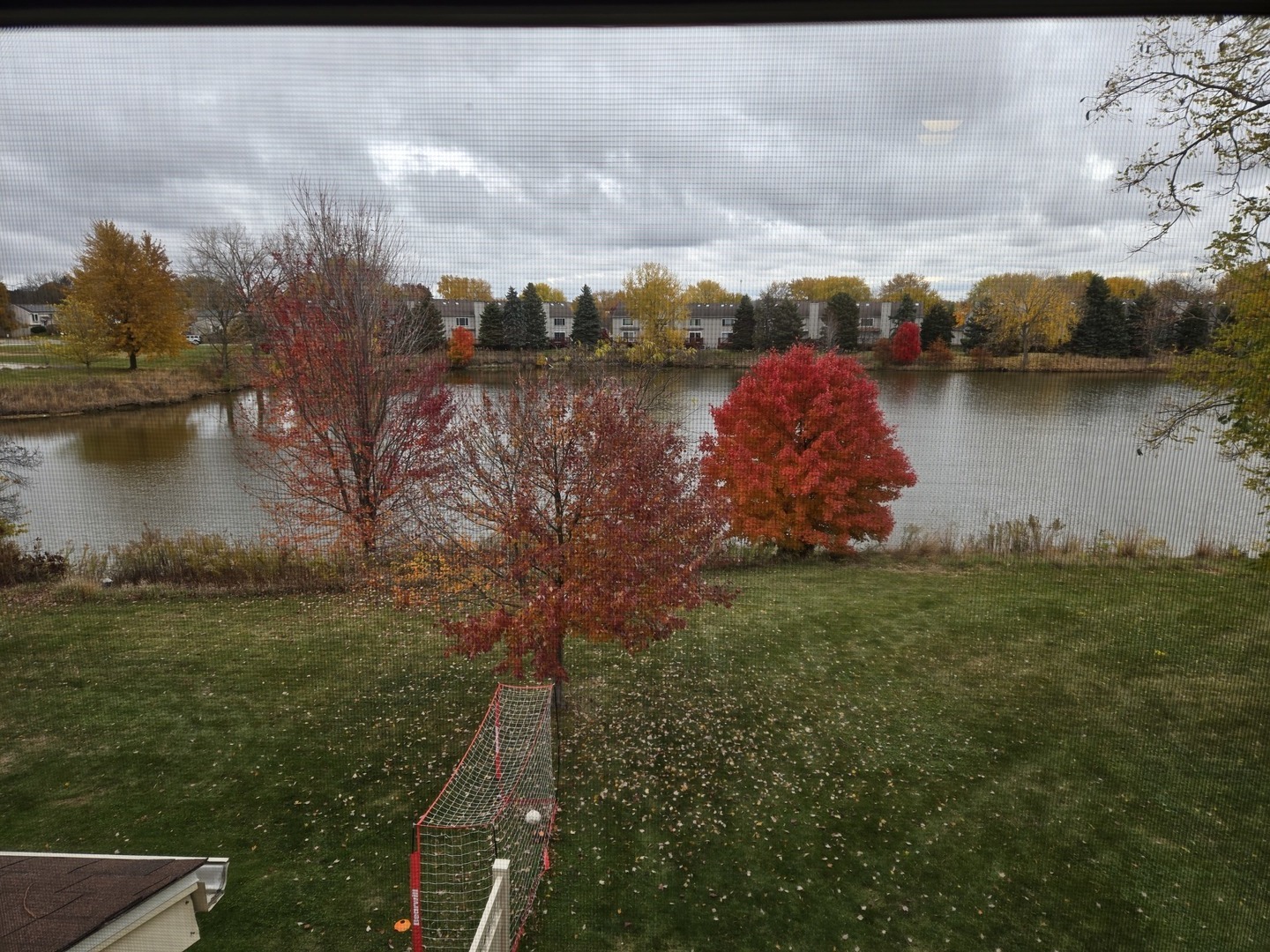 1513 Elder Drive Aurora, IL 60506 - Photo 25 of 26 a view of a lake with houses in back