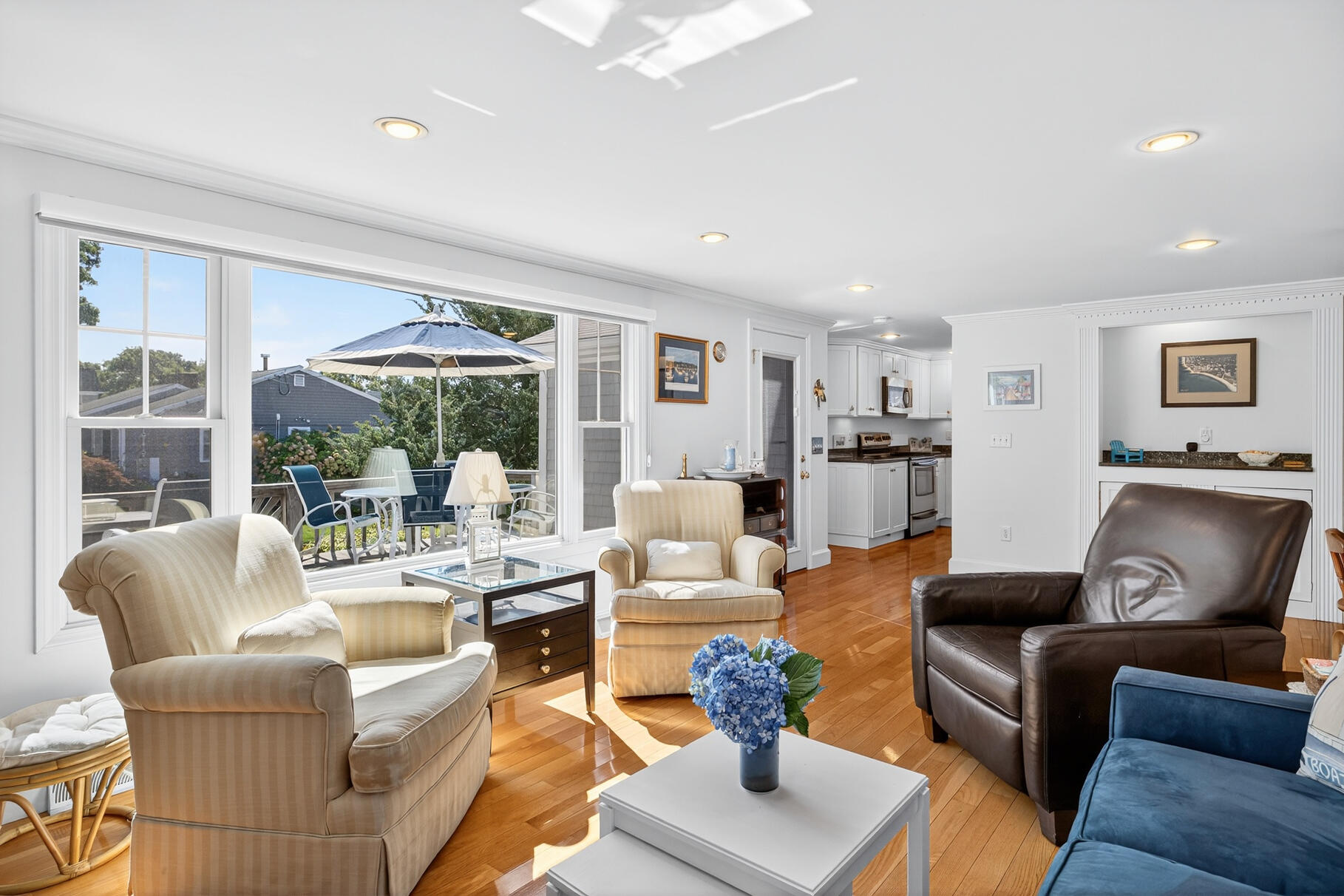 35 Shore Drive Mashpee, MA 02649 - Photo 16 of 36 a living room with furniture and a large window
