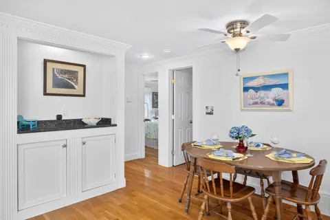 a kitchen with stainless steel appliances granite countertop a refrigerator sink and stove