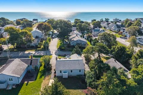 an aerial view of a house roof deck