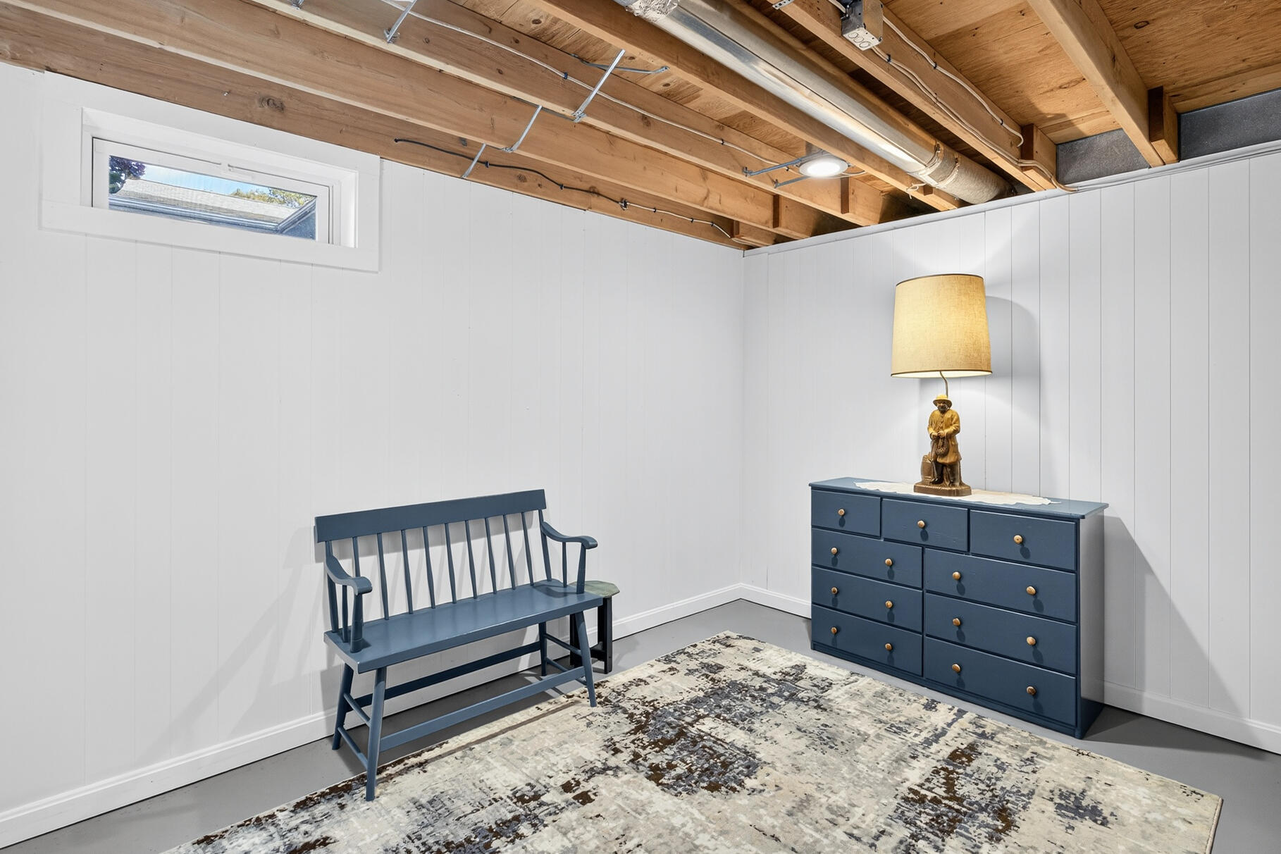 35 Shore Drive Mashpee, MA 02649 - Photo 26 of 36 a bedroom with a bed and a dresser