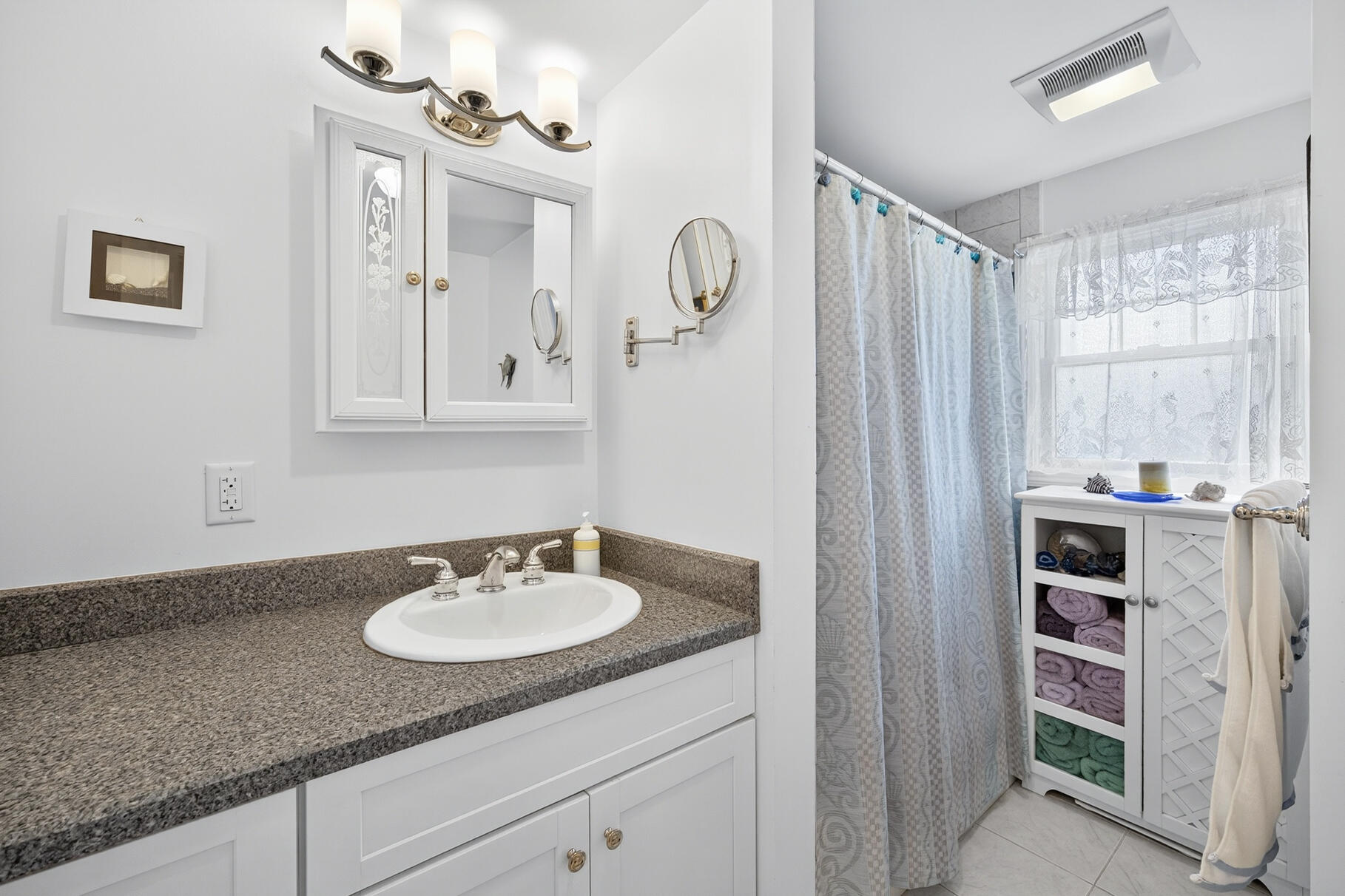 35 Shore Drive Mashpee, MA 02649 - Photo 31 of 36 a bathroom with a sink double vanity and a mirror