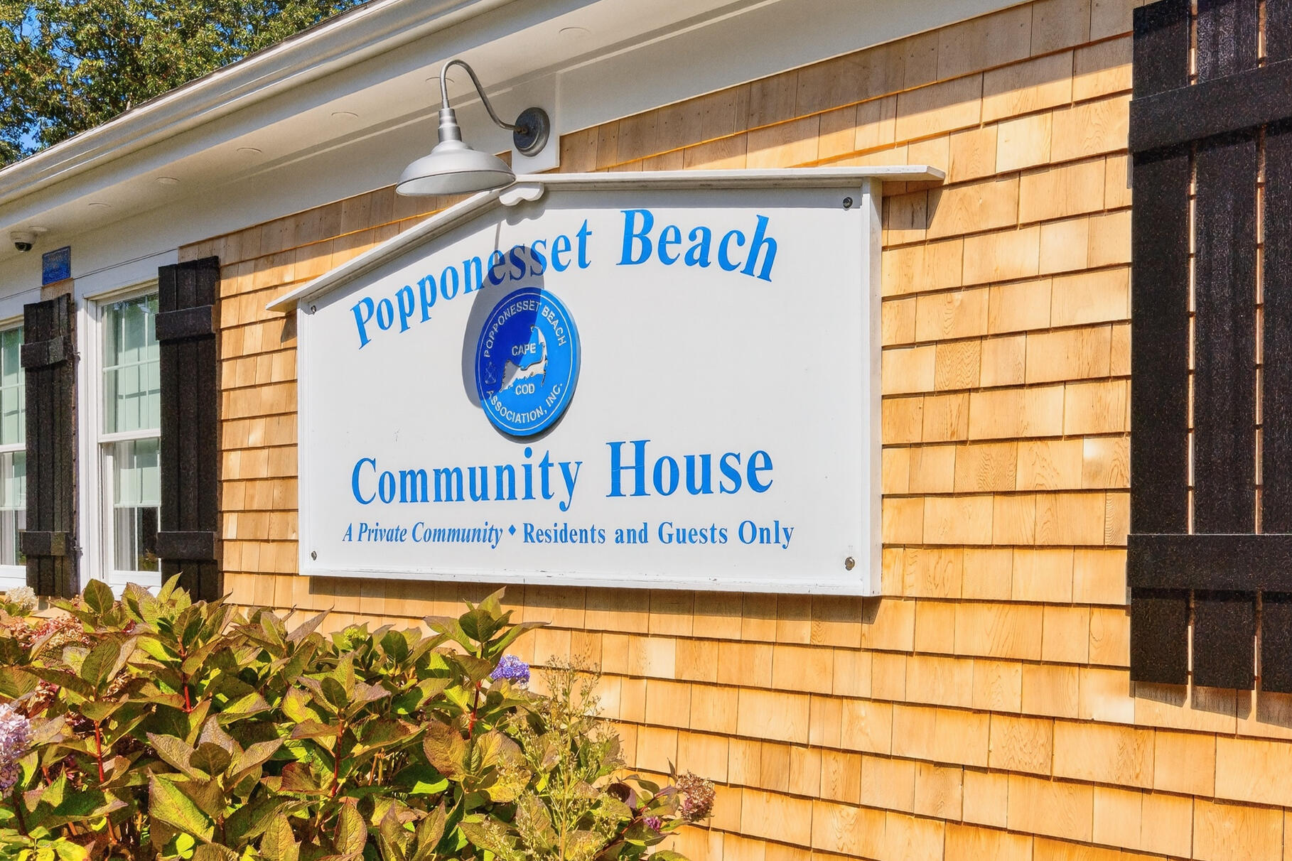 35 Shore Drive Mashpee, MA 02649 - Photo 34 of 36 a sign on the wall