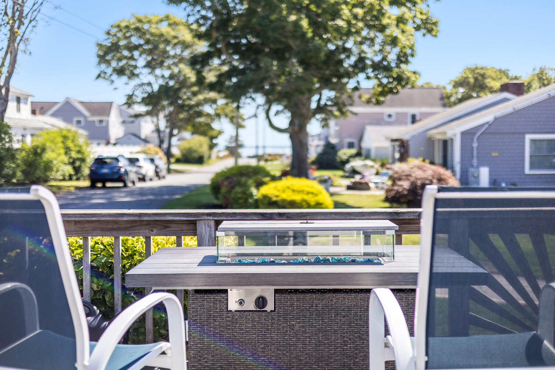 35 Shore Drive Mashpee, MA 02649 - Photo 9 of 36 a view of an outdoor sitting area with a table and chair