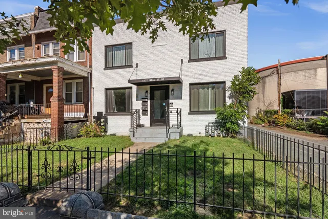 a house view with a garden space