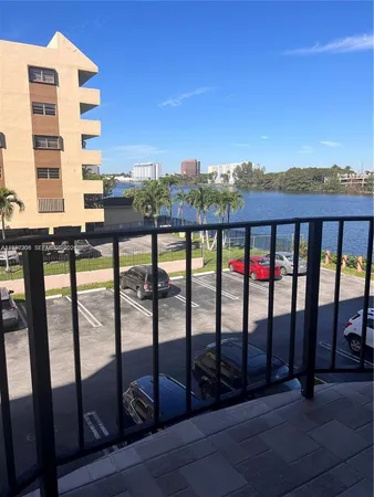 a view of balcony with furniture and city view