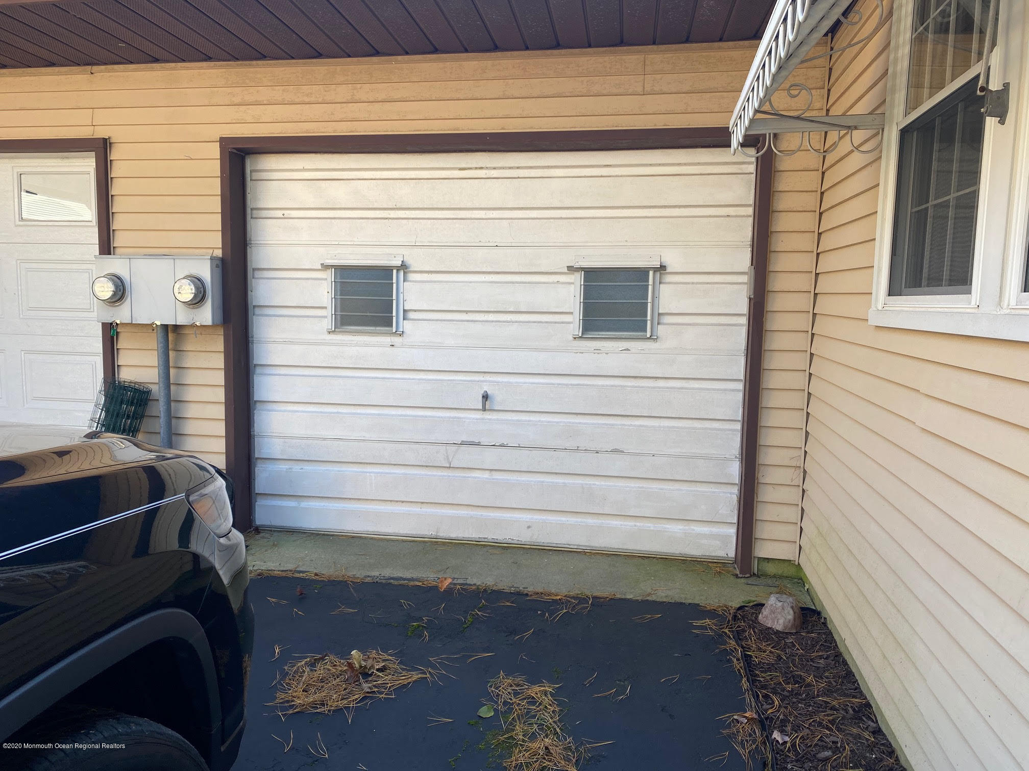 25 A Stonybrook Road Whiting, NJ 08759 - Photo 4 of 13 a view of a door and chair in the balcony