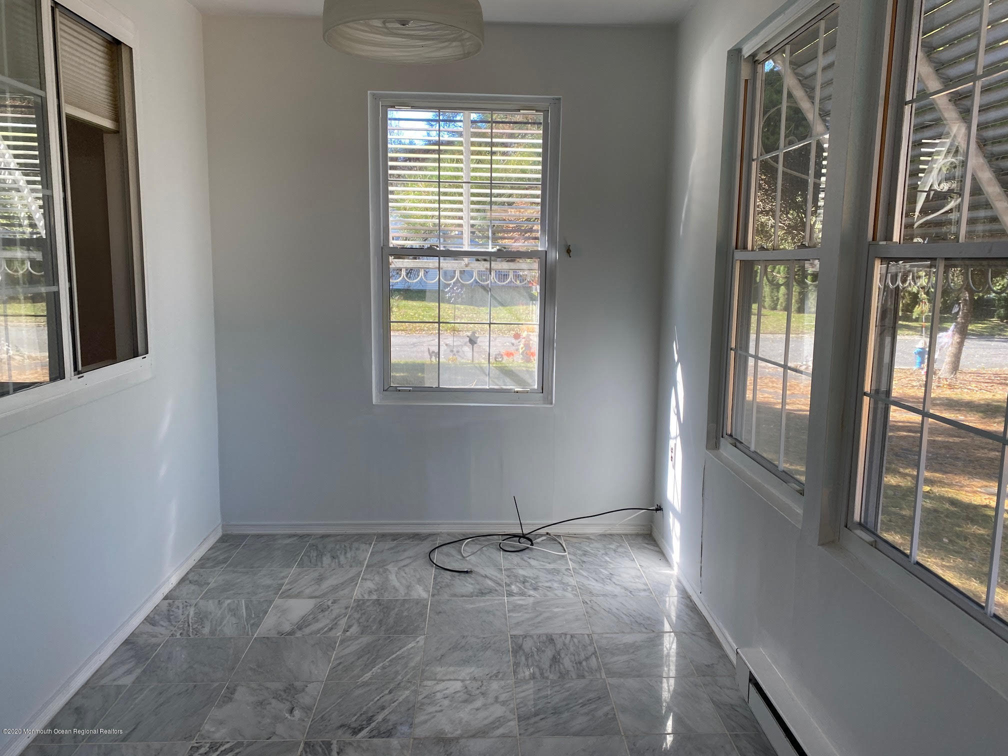 25 A Stonybrook Road Whiting, NJ 08759 - Photo 5 of 13 an empty room with windows