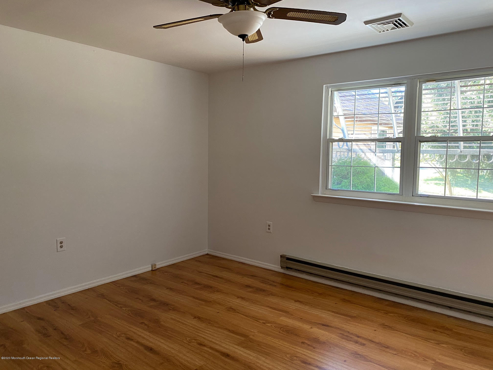 25 A Stonybrook Road Whiting, NJ 08759 - Photo 7 of 13 an empty room with a window