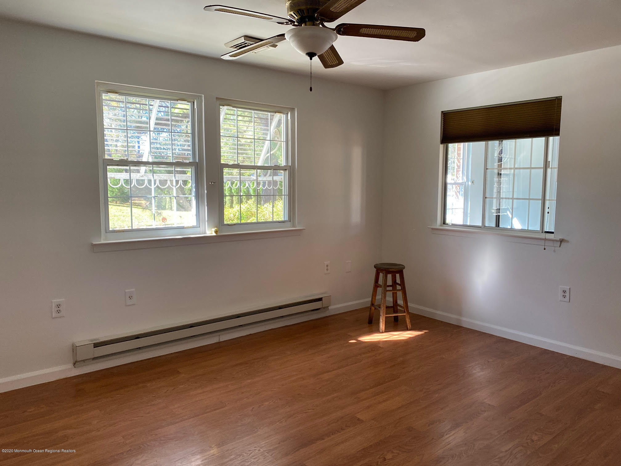 25 A Stonybrook Road Whiting, NJ 08759 - Photo 9 of 13 a room with window and wooden floor