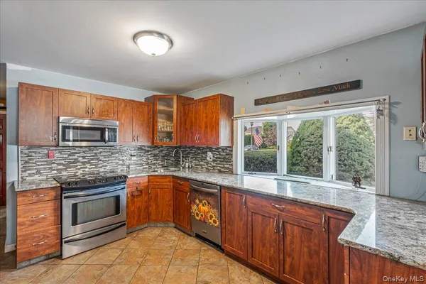 $710,000 | 236 Duckpond Drive South, Wantagh, NY 11793