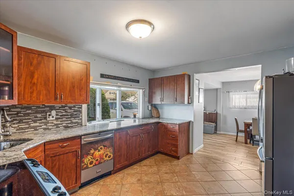 $710,000 | 236 Duckpond Drive South, Wantagh, NY 11793
