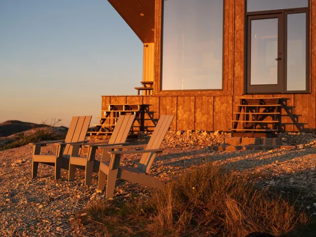 a view of a lake with mountains in the background