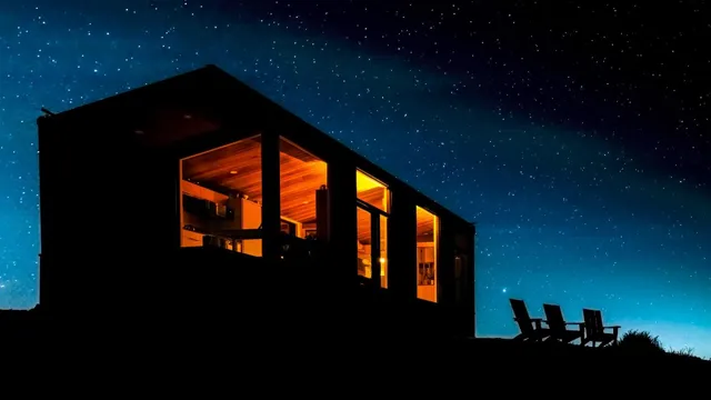 a view of an empty room and wooden floor