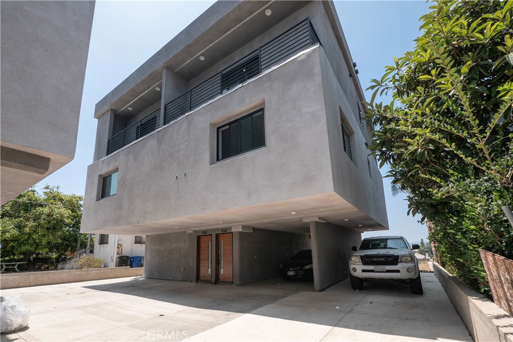 1571 Ricardo Street Los Angeles, CA 90033 - Photo 21 of 29 a front view of a building with parking