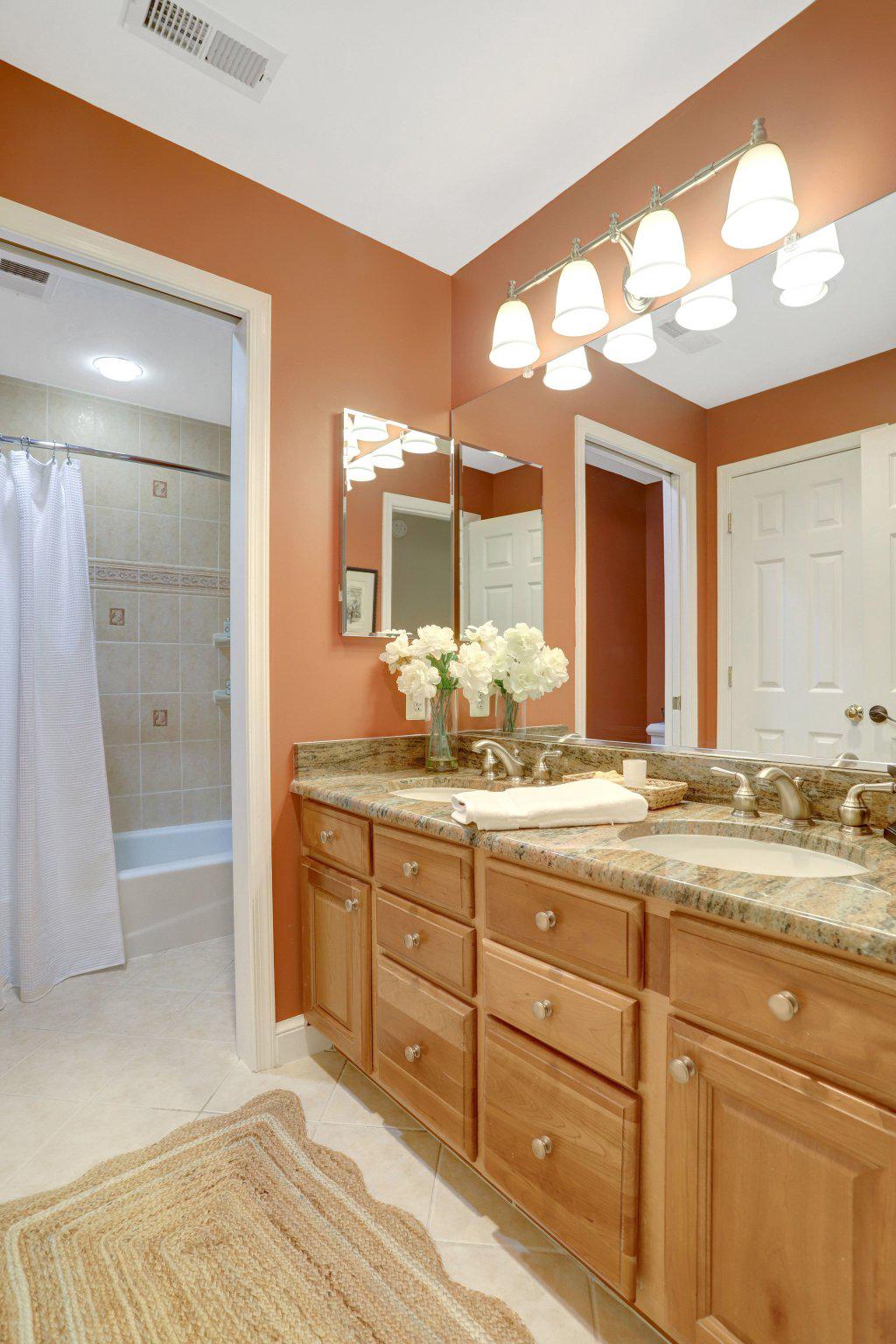 7506 Oriole Avenue Springfield, VA 22150 - Photo 30 of 67 a bathroom with a granite countertop sink mirror and