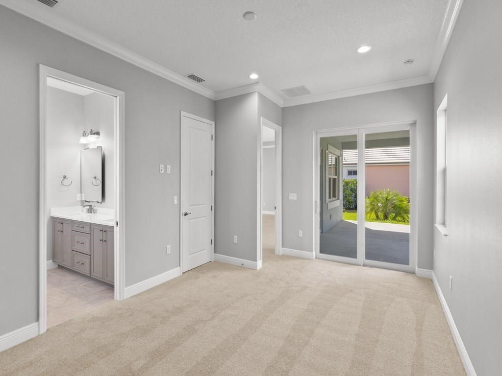 1891 East Cayman Road Vero Beach, FL 32963 - Photo 15 of 27 a view of an empty room and window