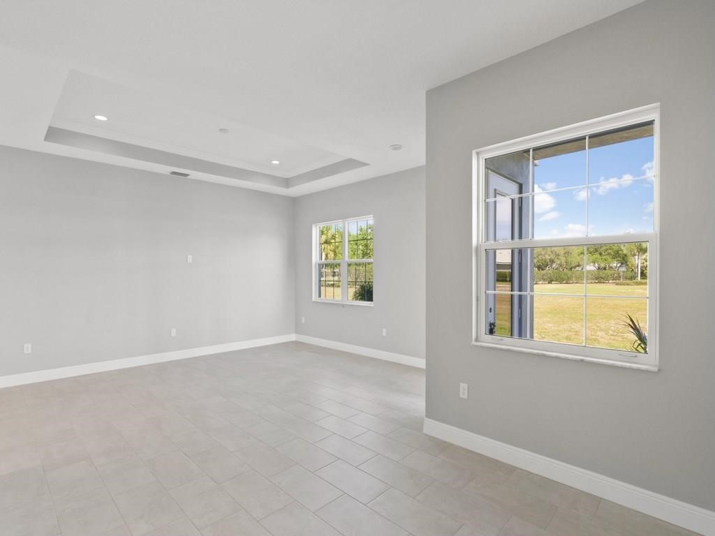 1891 East Cayman Road Vero Beach, FL 32963 - Photo 4 of 27 a view of an empty room with a window