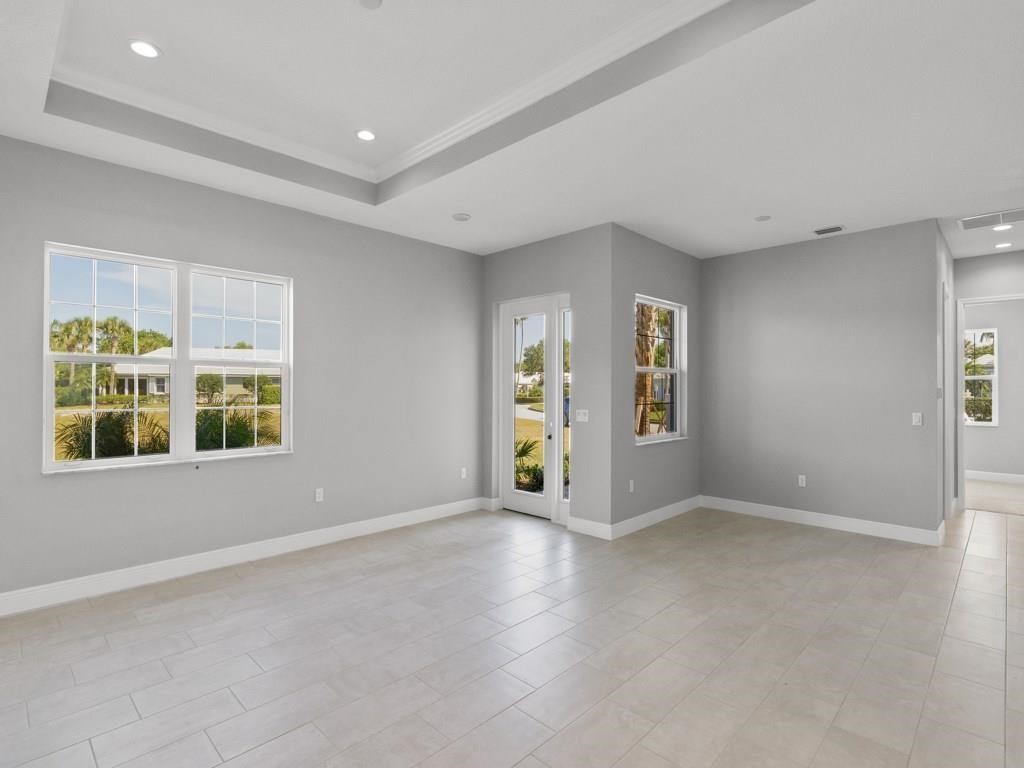1891 East Cayman Road Vero Beach, FL 32963 - Photo 6 of 27 an empty room with windows