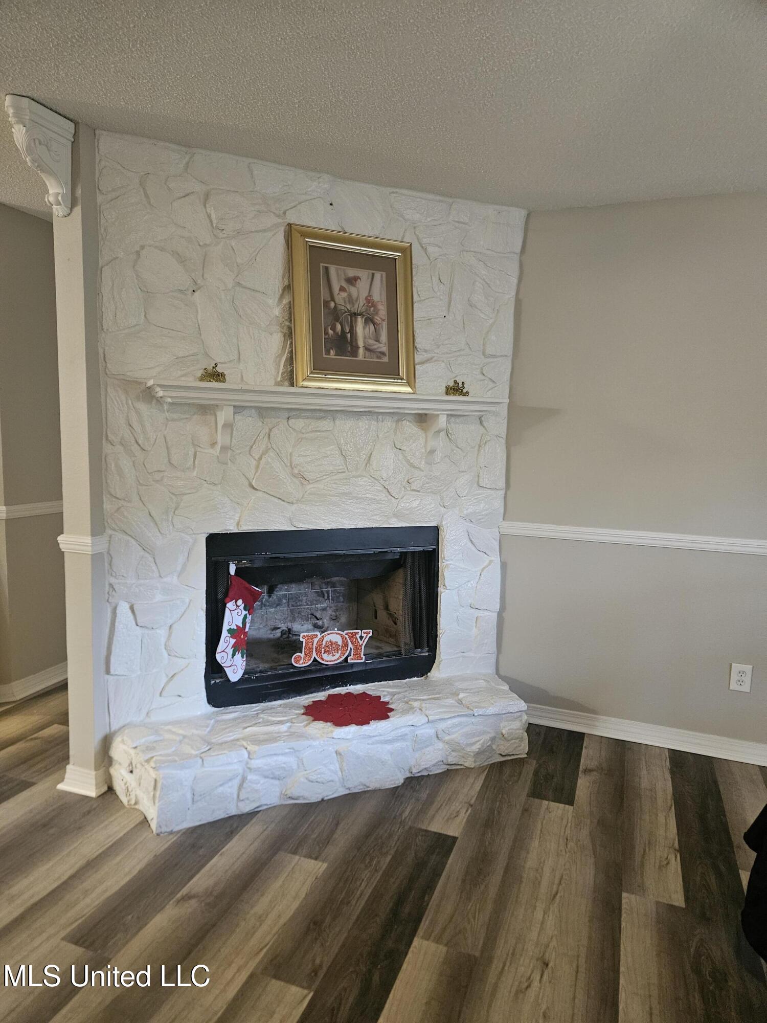 10373 Woolmarket Lake Road Biloxi, MS 39532 - Photo 5 of 32 Den fireplace