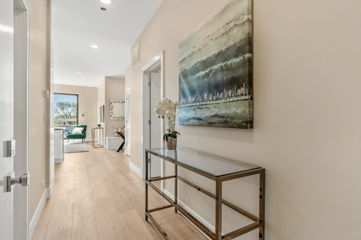 Undisclosed Address Chicago, IL 60657 - Photo 13 of 22 a living room with furniture and a painting on the wall