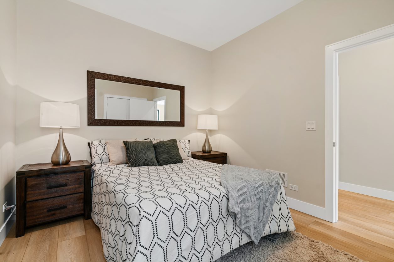 Undisclosed Address Chicago, IL 60657 - Photo 14 of 22 a bedroom with a bed and a desk