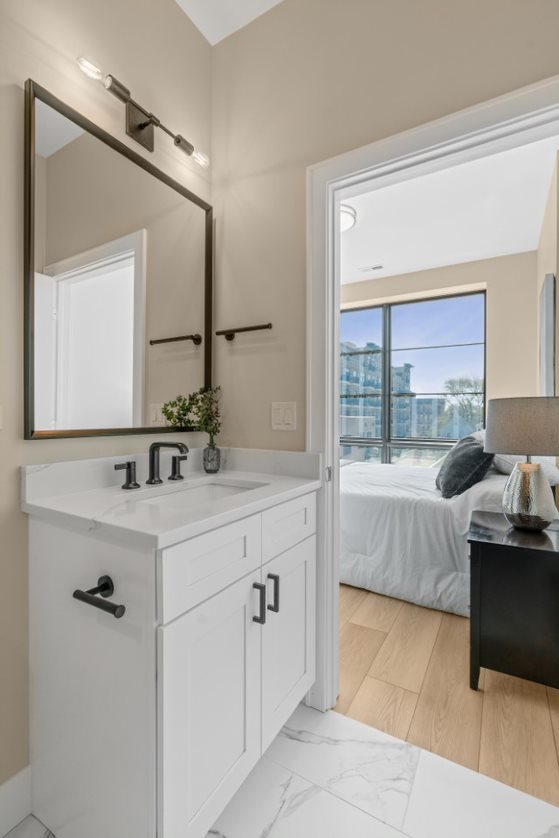 Undisclosed Address Chicago, IL 60657 - Photo 20 of 22 a en suite bathroom with a double vanity sink mirror and