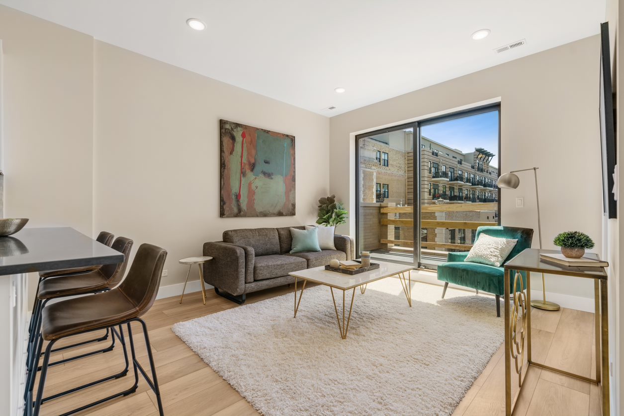 Undisclosed Address Chicago, IL 60657 - Photo 5 of 22 a living room with furniture and a painting on the wall